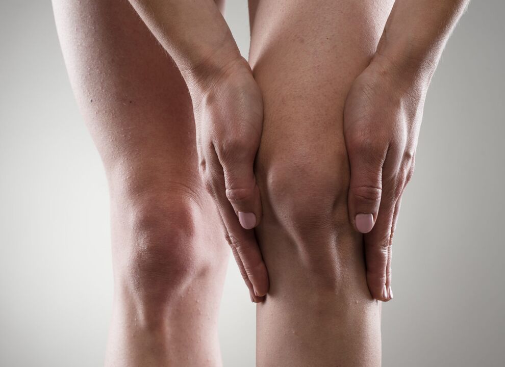 Osteoartrita articulației genunchiului, manifestându-se ca durere și rigiditate